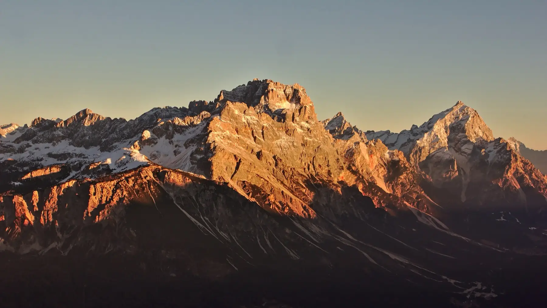 Sorapiss and Antelao glowing rose-orange at dusk